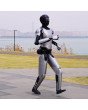 MagicBot Gen2 humanoider Roboter joggt auf einem Gehweg im Freien mit Stadt im Hintergrund